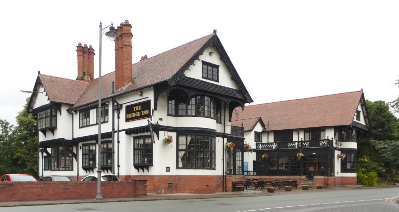 The Bridge Inn on Bolton Road, Port Sunlight, listed Grade II in 1965 and built in 1900 to designs by Grayson and Ould